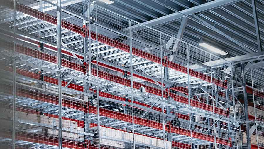Mesh panles used in a warehouse to keep goods from falling to the ground