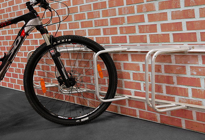 Vårt utbud av cykelställ för placering på väggen  Vårt utbud av cykelställ för placering på väggen